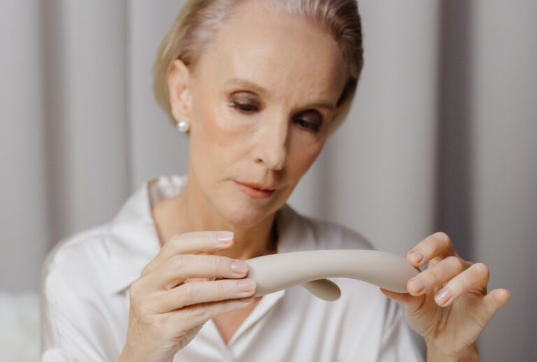 Elderly Woman Looking at a Vibrator